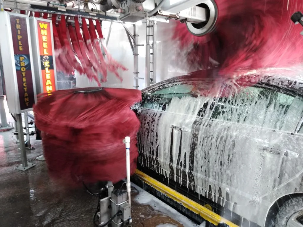 Foam and brushes in the car wash tunnel